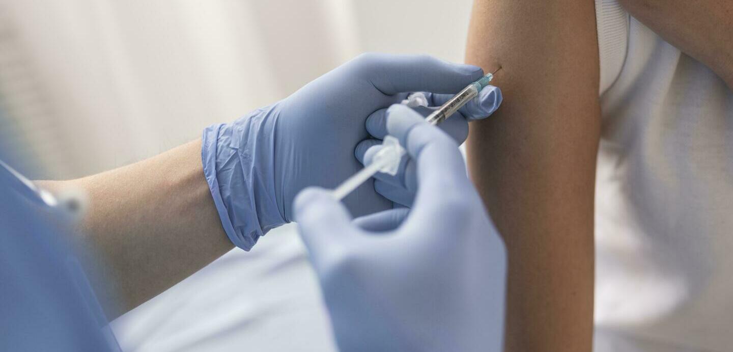 doctor-vaccinating-a-patient-in-a-clinic